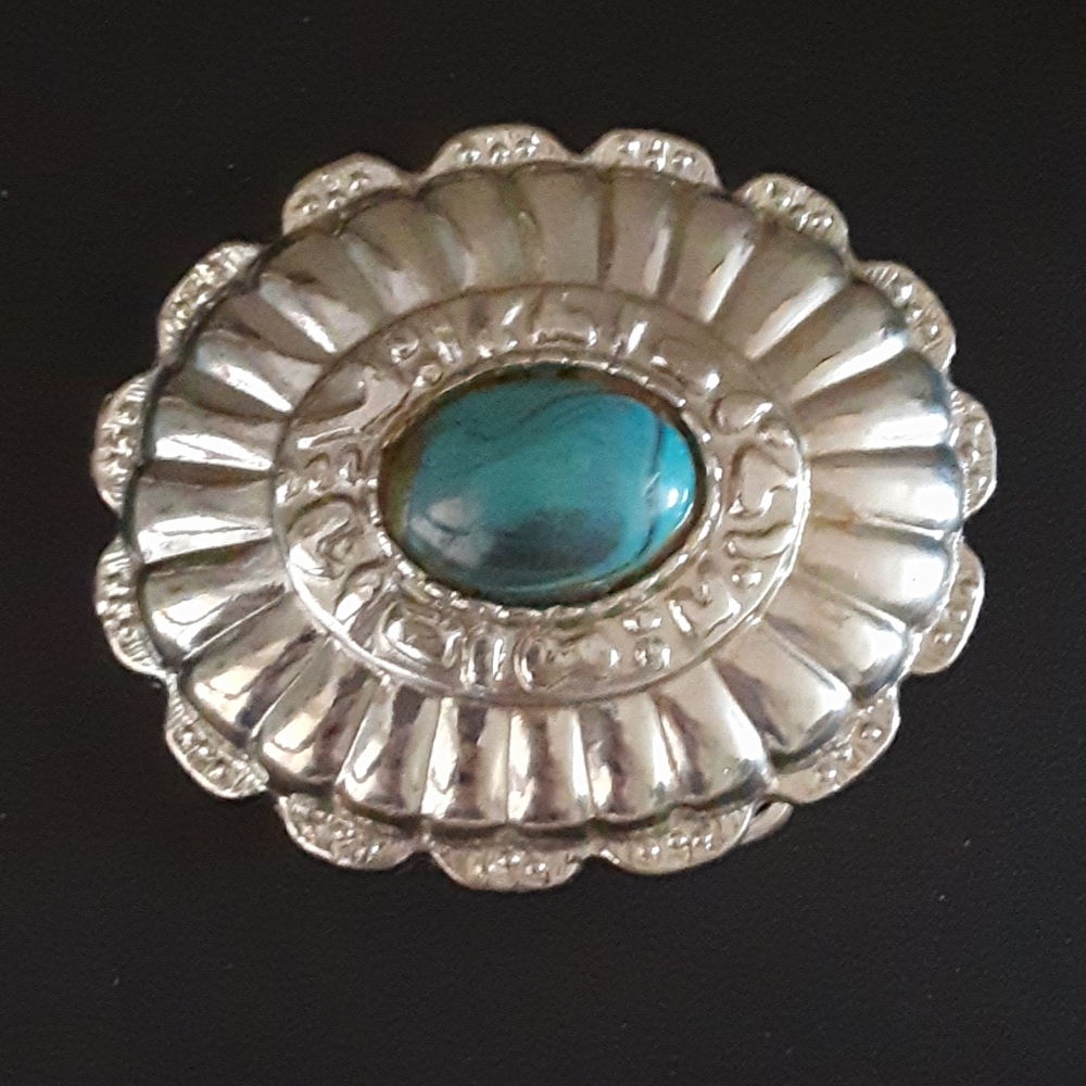 Conch belt buckle